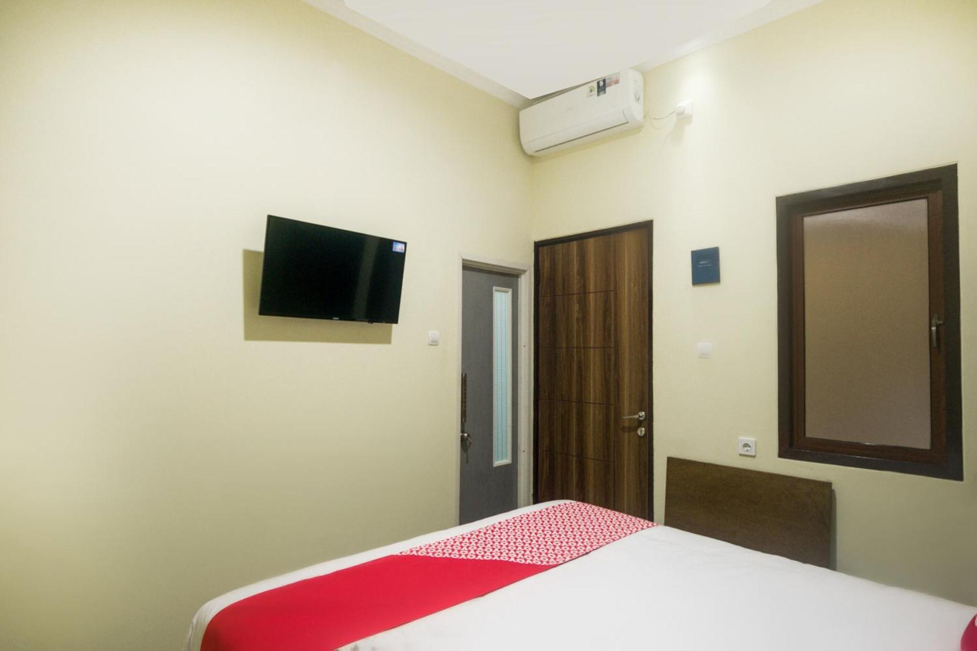 Super Oyo 3354 Homia Residence Mencil المظهر الخارجي الصورة